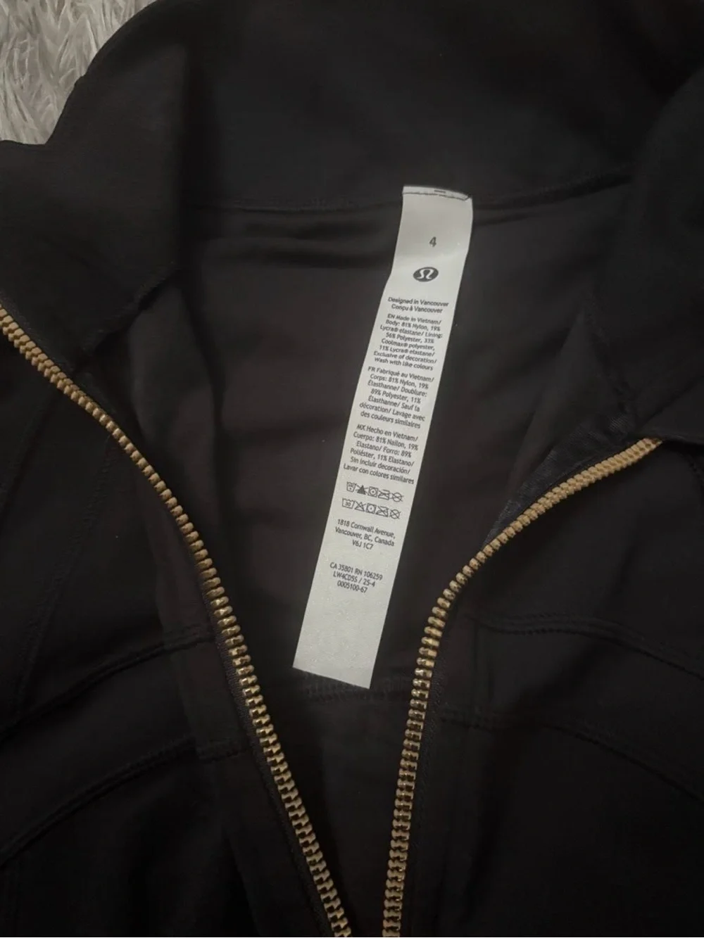 lululemon Black Jacket with Gold Zipper Detail